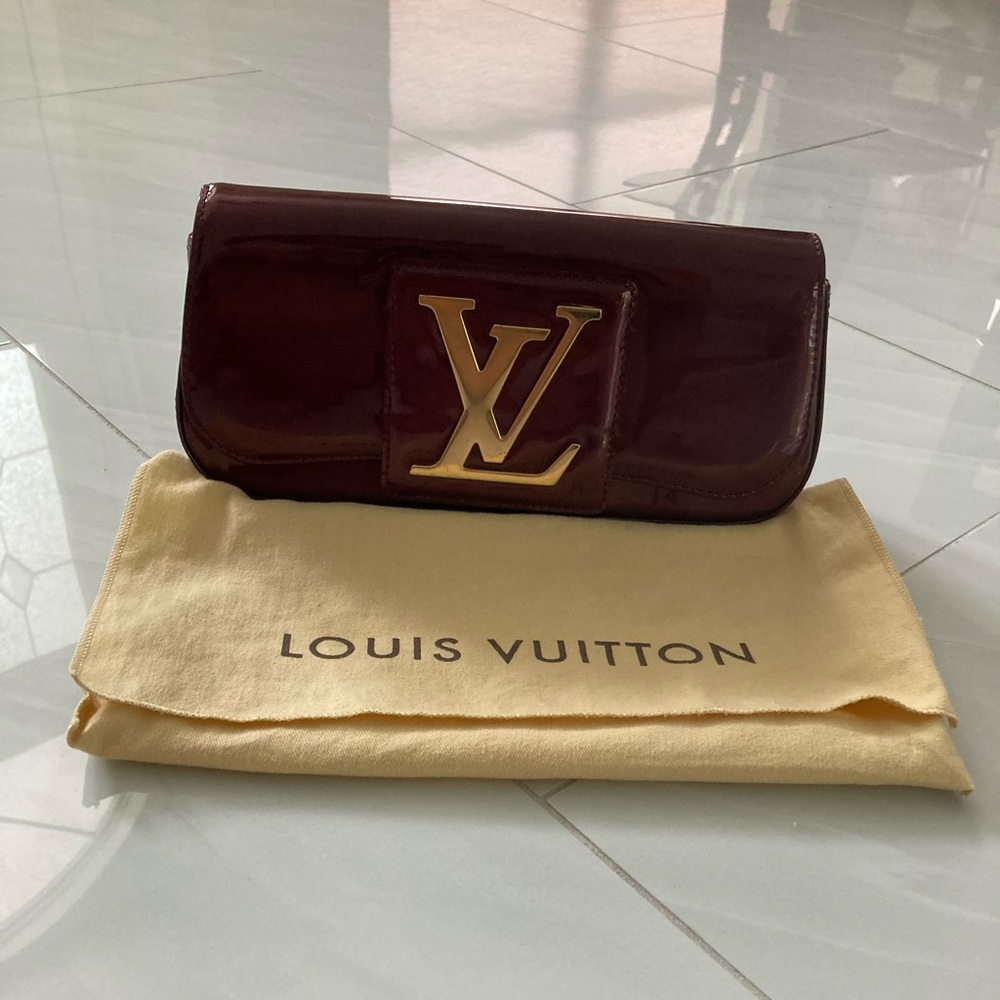 Authentic Louis Vuitton merlot patent clutch bag